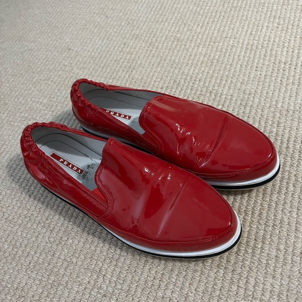 Gorgeous patent leather red Prada loafers